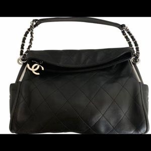 CHANEL black ultimate Lambskin Leather Hobo Bag in Like New condition.